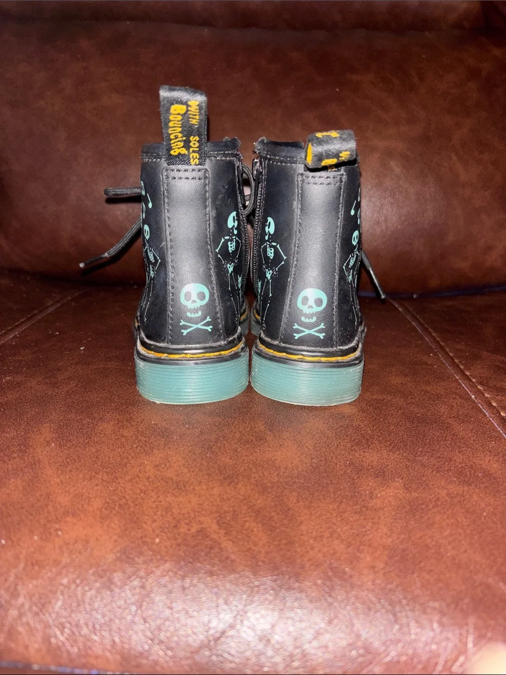 Dr. Martens Kids Black Boots with Teal Skull Accents